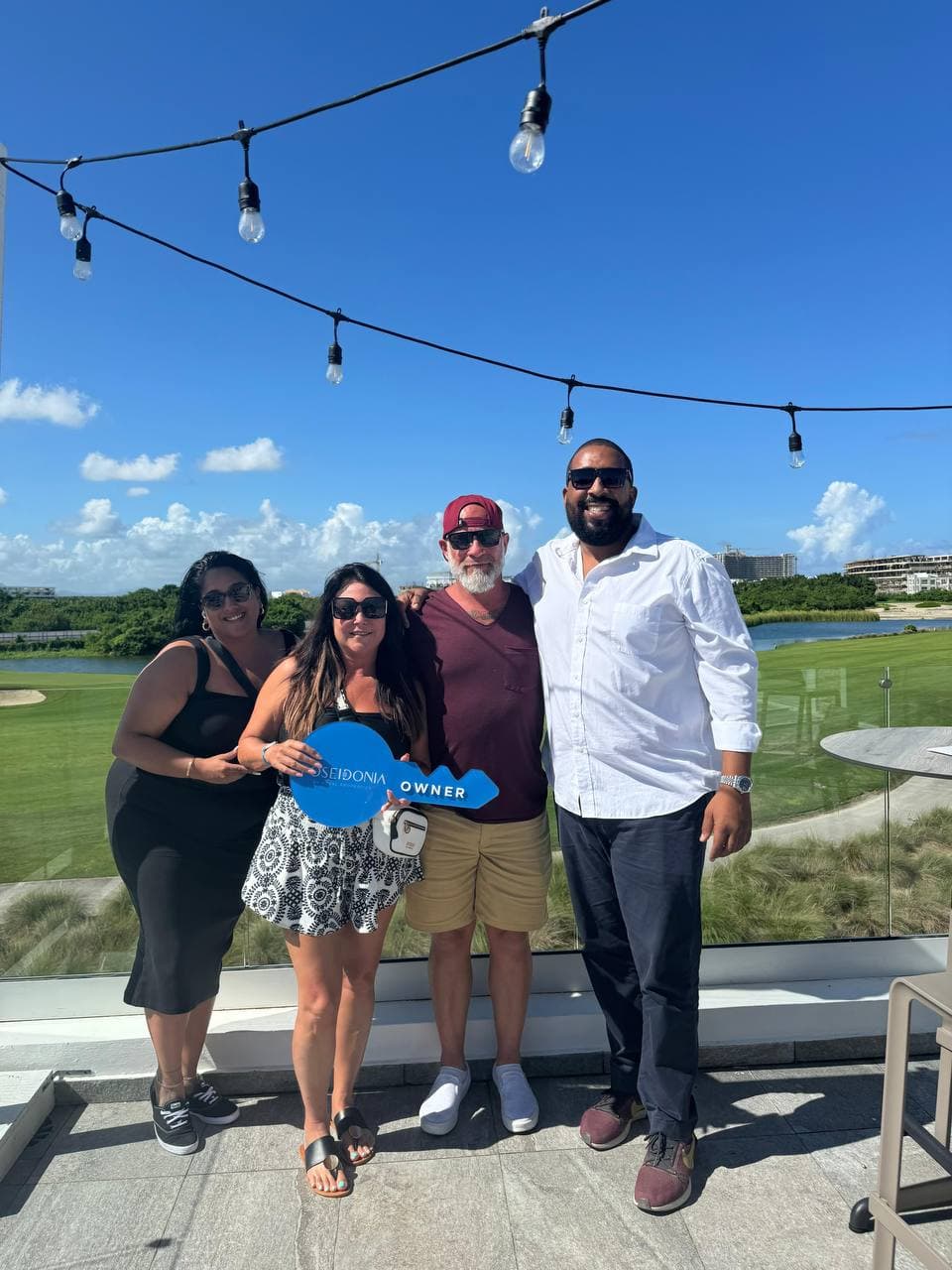 Happy clients at property handover